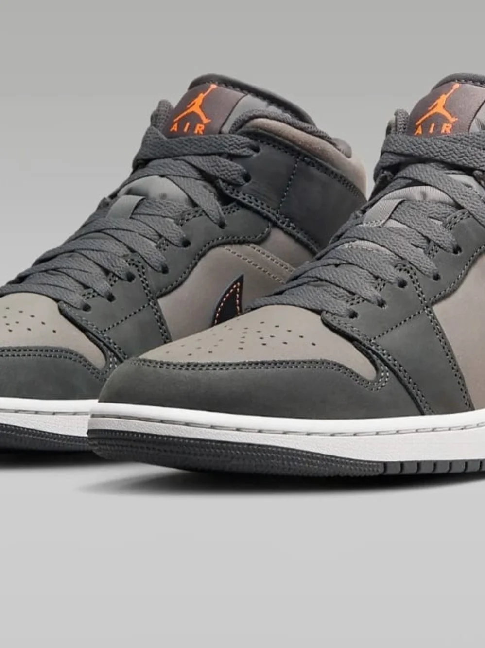 Jordan Mid-Top Sneakers in Gray with Orange Stitching